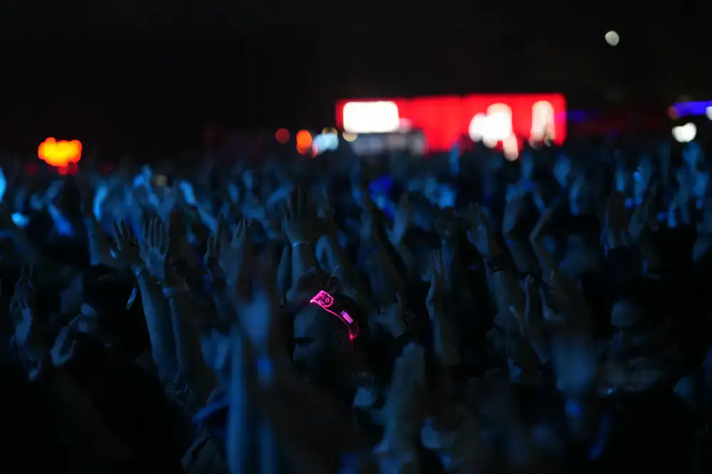 Crowd cheering at a live esports broadcast in the lounge