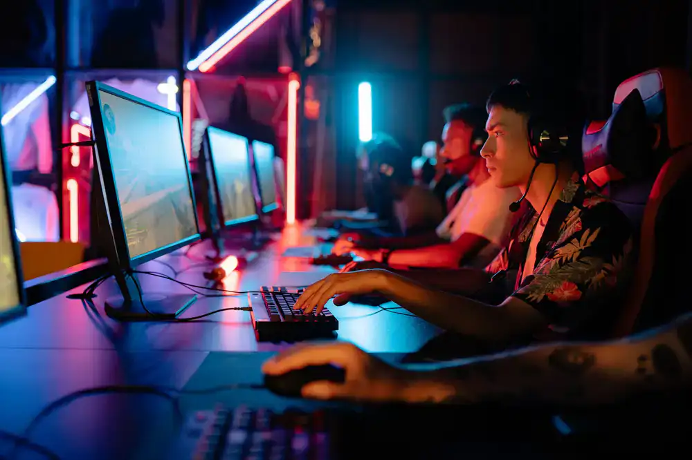 Players competing in a local LAN tournament setting